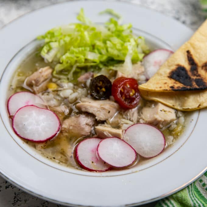 Bowl of Green chicken pozole.