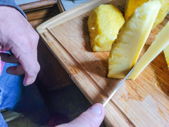 Cutting out the core of the fruit.