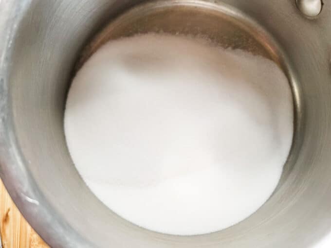 Sugar in a saucepan.