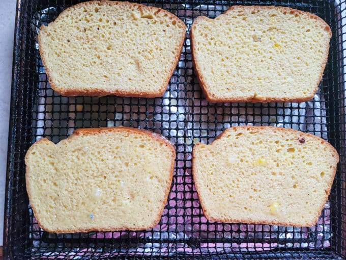 Bread placed on the air fryer basket.