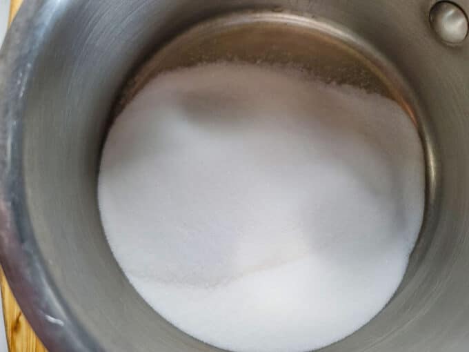 Sugar in a saucepan.