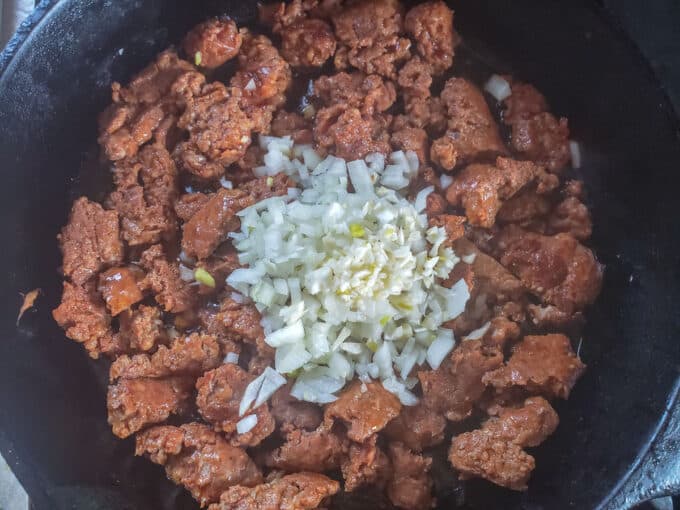 Onion and garlic added to the meat soften.