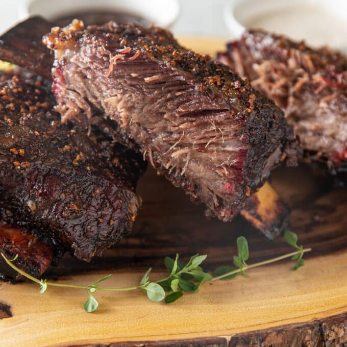 Slice beef short rib with red smoke line.