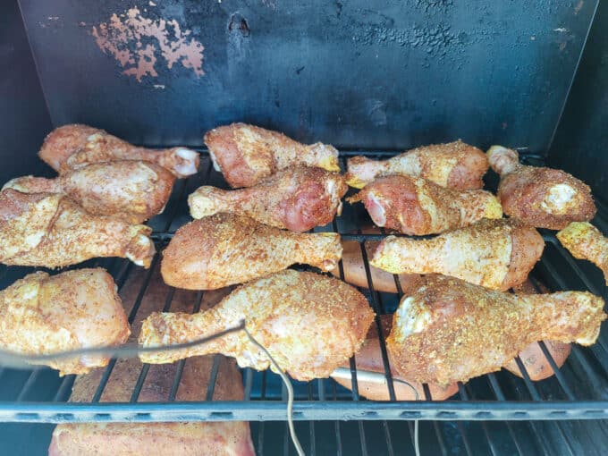 Drumsticks on rack in the smoker.