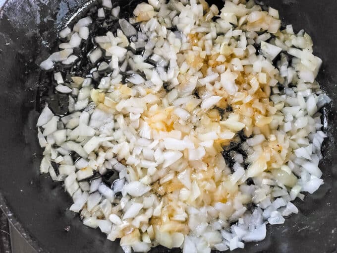 Onions in skillet, golden brown.