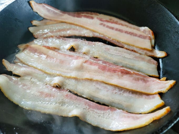 Bacon in cast iron skillet.