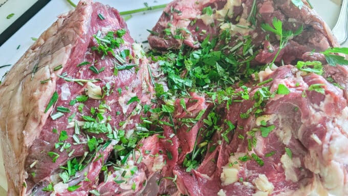 Roast slathered with roasted garlic and topped with fresh herbs.