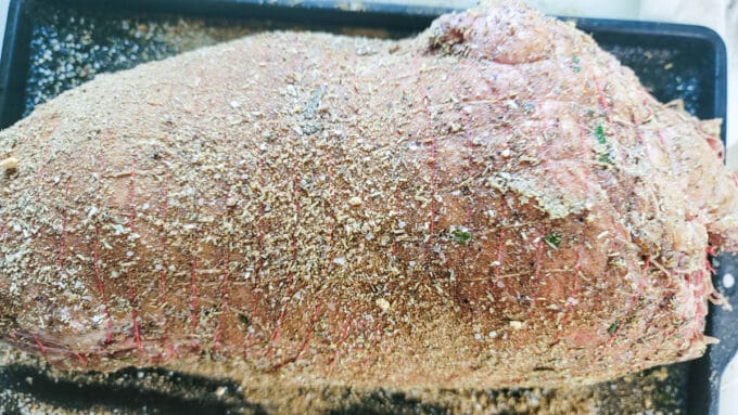 Roast seasoned with the mustard and dry rub.