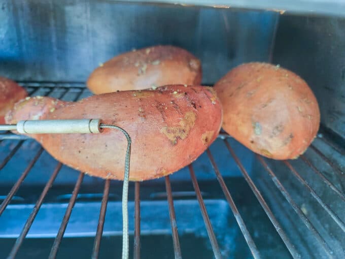 Sweet potatoes on smoker rack.