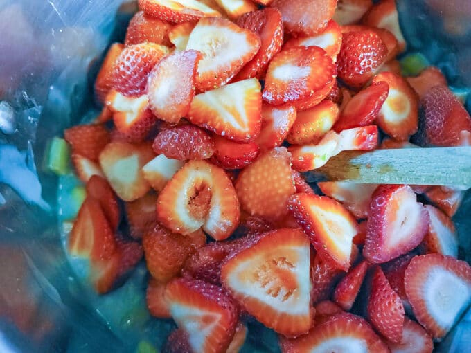 Strawberries added to the pie filling.