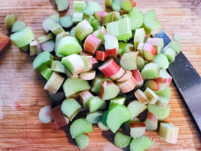 Chopped rhubarb on a cutting board.