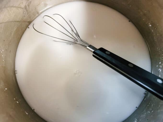Whisk in the pot with the thickener.