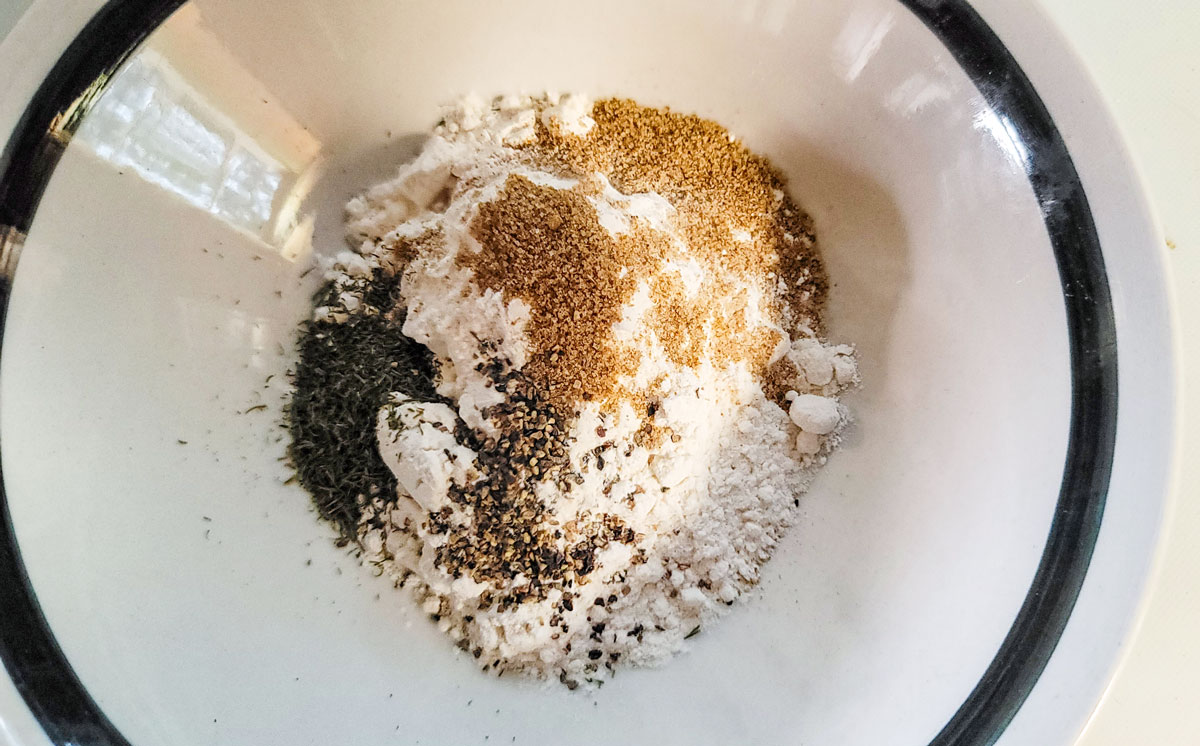 Flour and spices in a bowl.