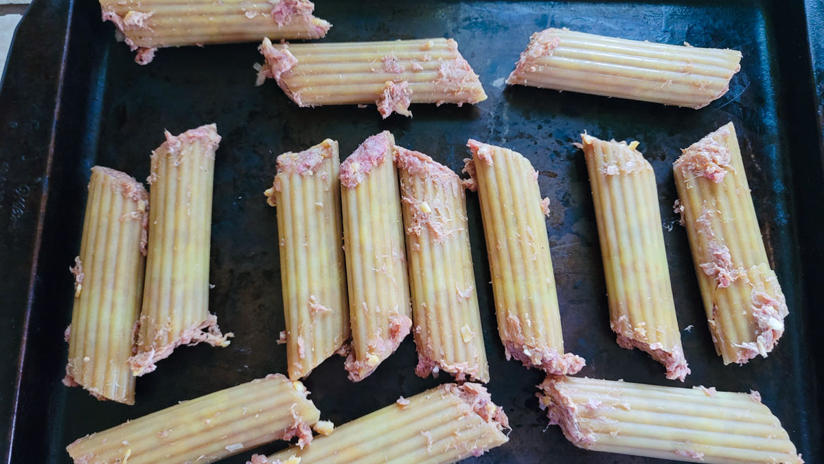 Stuffed shells on a baking sheet. 