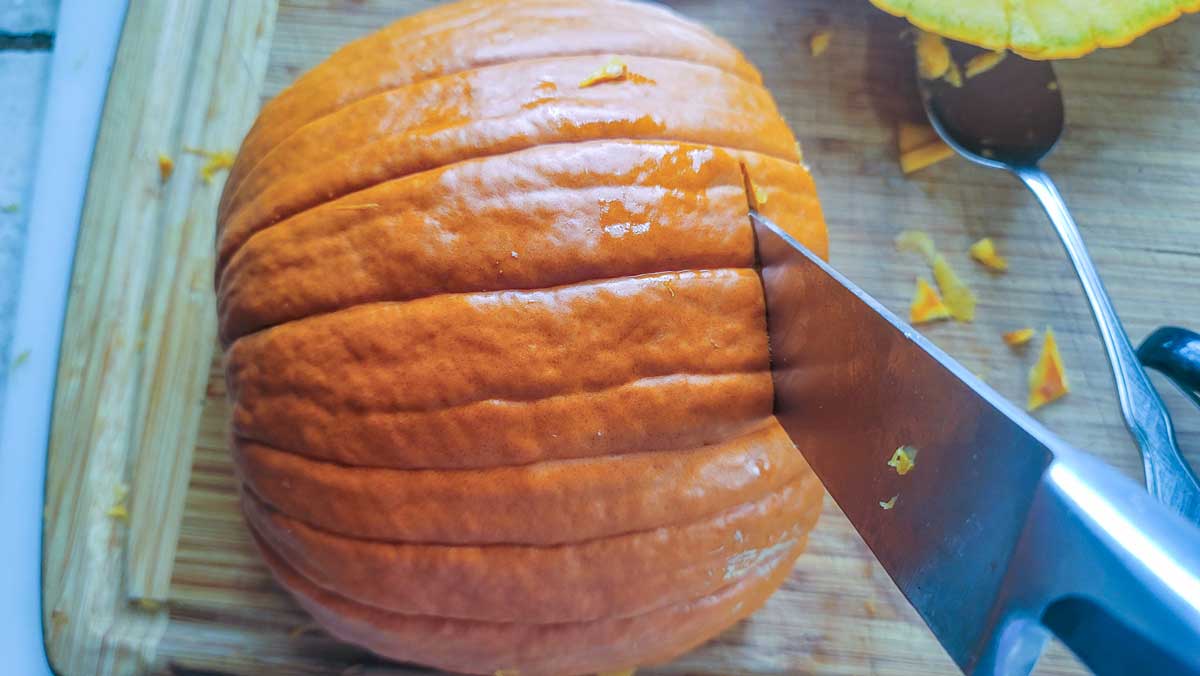 Slicing the pumpkin.