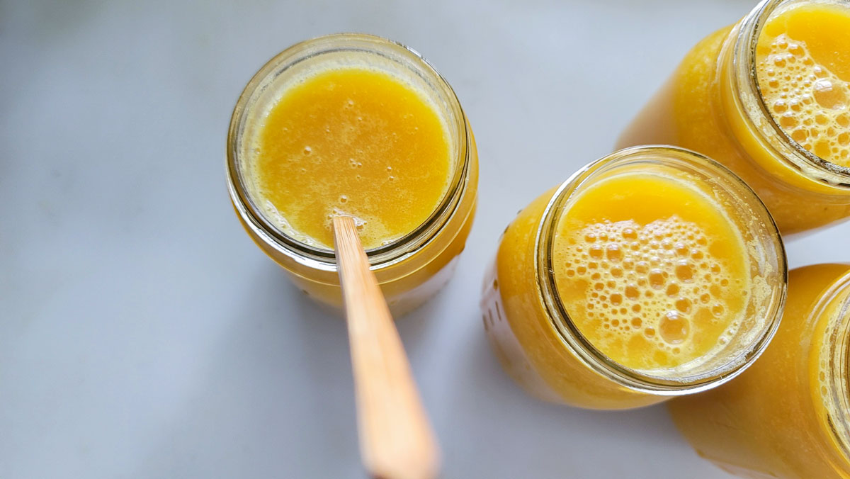 Removing air bubbles with a wooden chopstick.