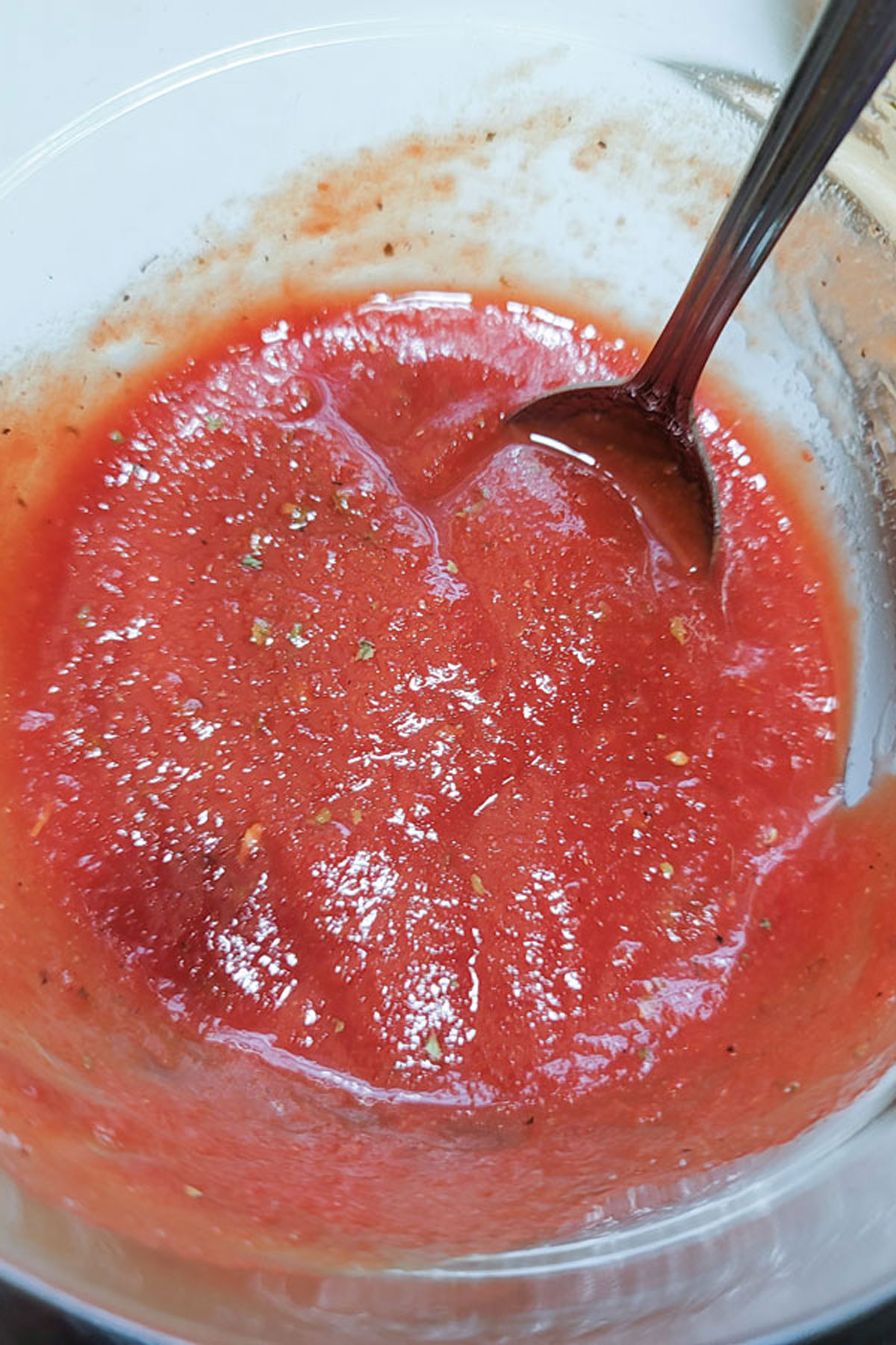 Spices mixed into the sauce.