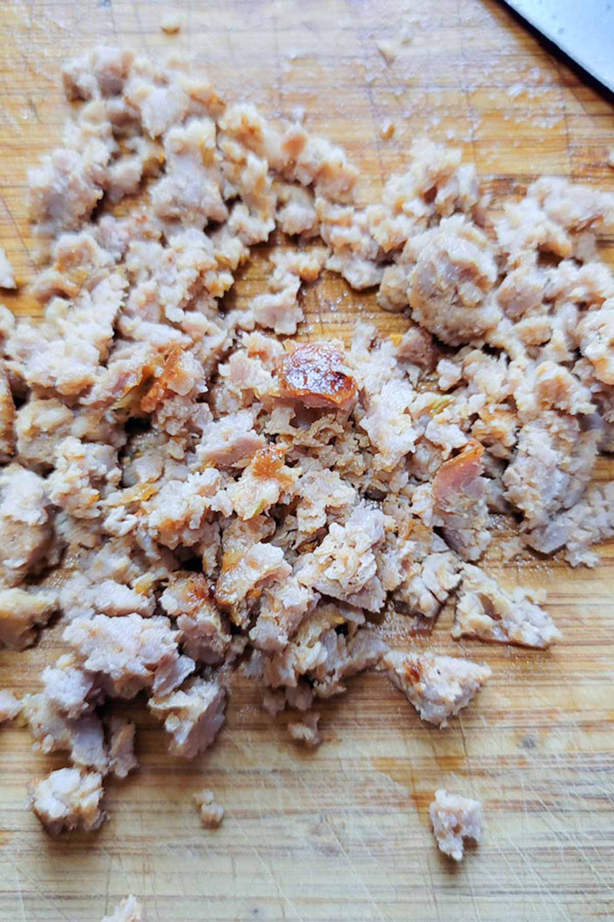 Sausage chopped into small pieces.