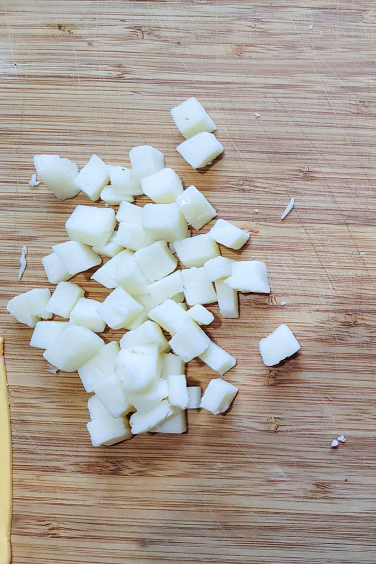 Mozzarella cut into small cubes.