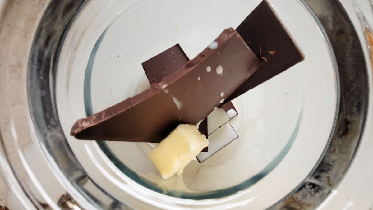 Chocolate butter and milk in a double boiler.