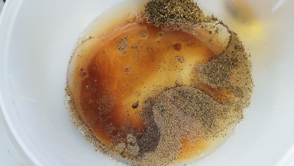 Marinade ingredients in a medium bowl.