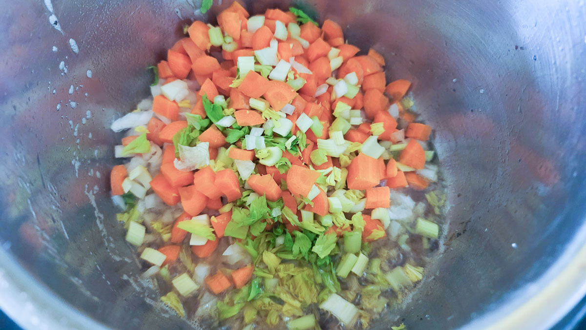 Vegetables sautéing in the instant pot.
