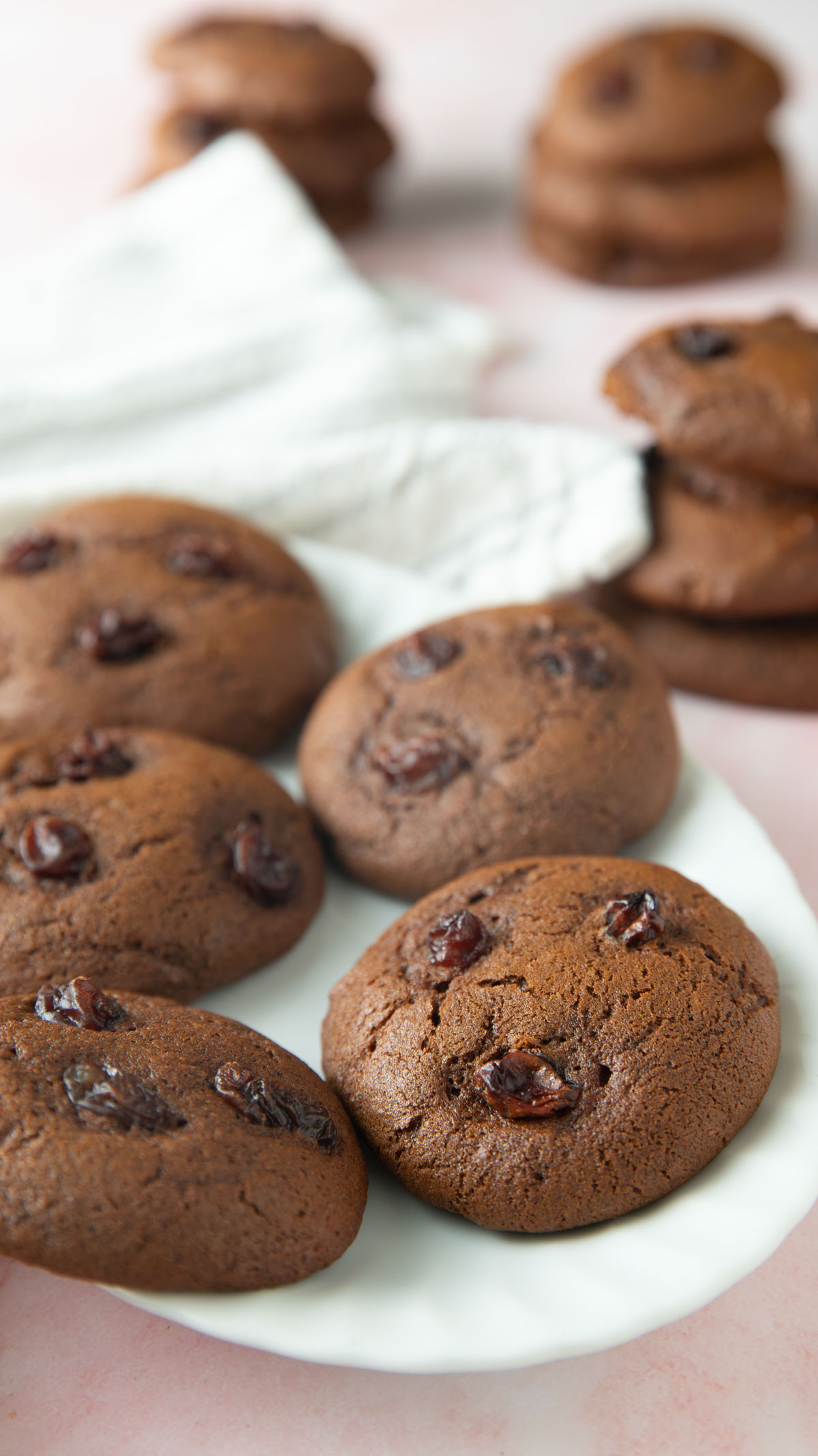 White oval plate with molasses cookies on it.