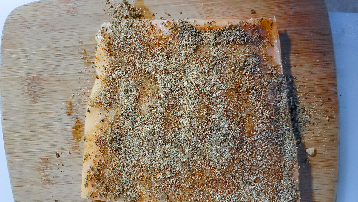 Salmon coated with spices.