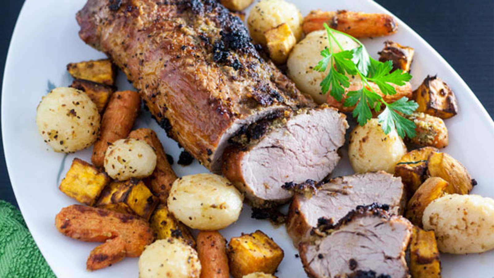 Pork loin with potatoes on the side.