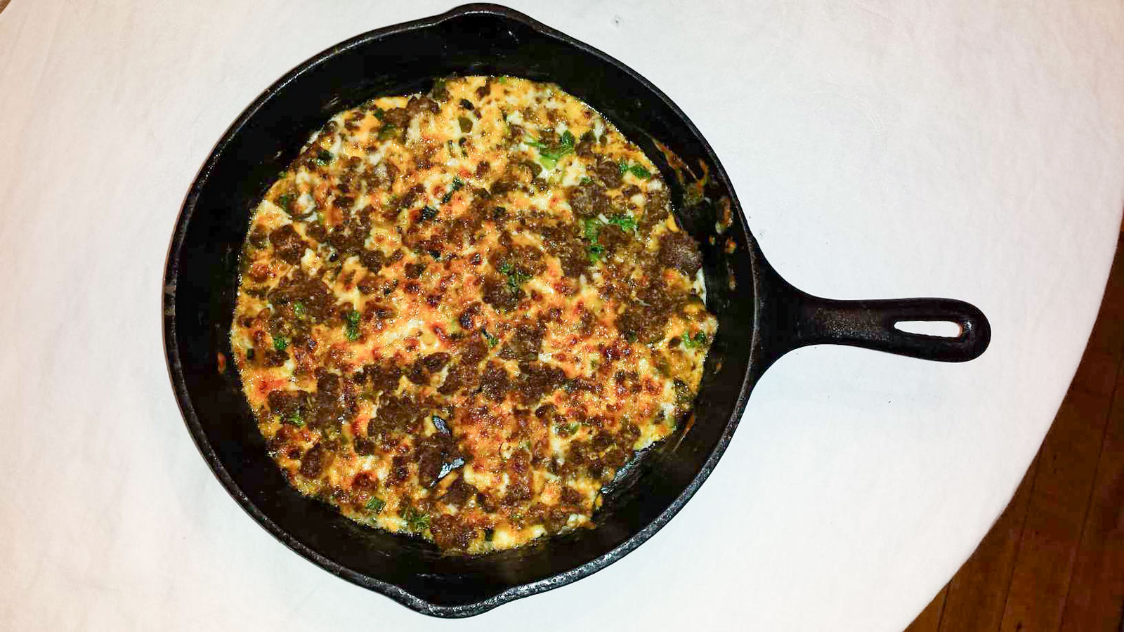 Queso fundido in cast iron pan.
