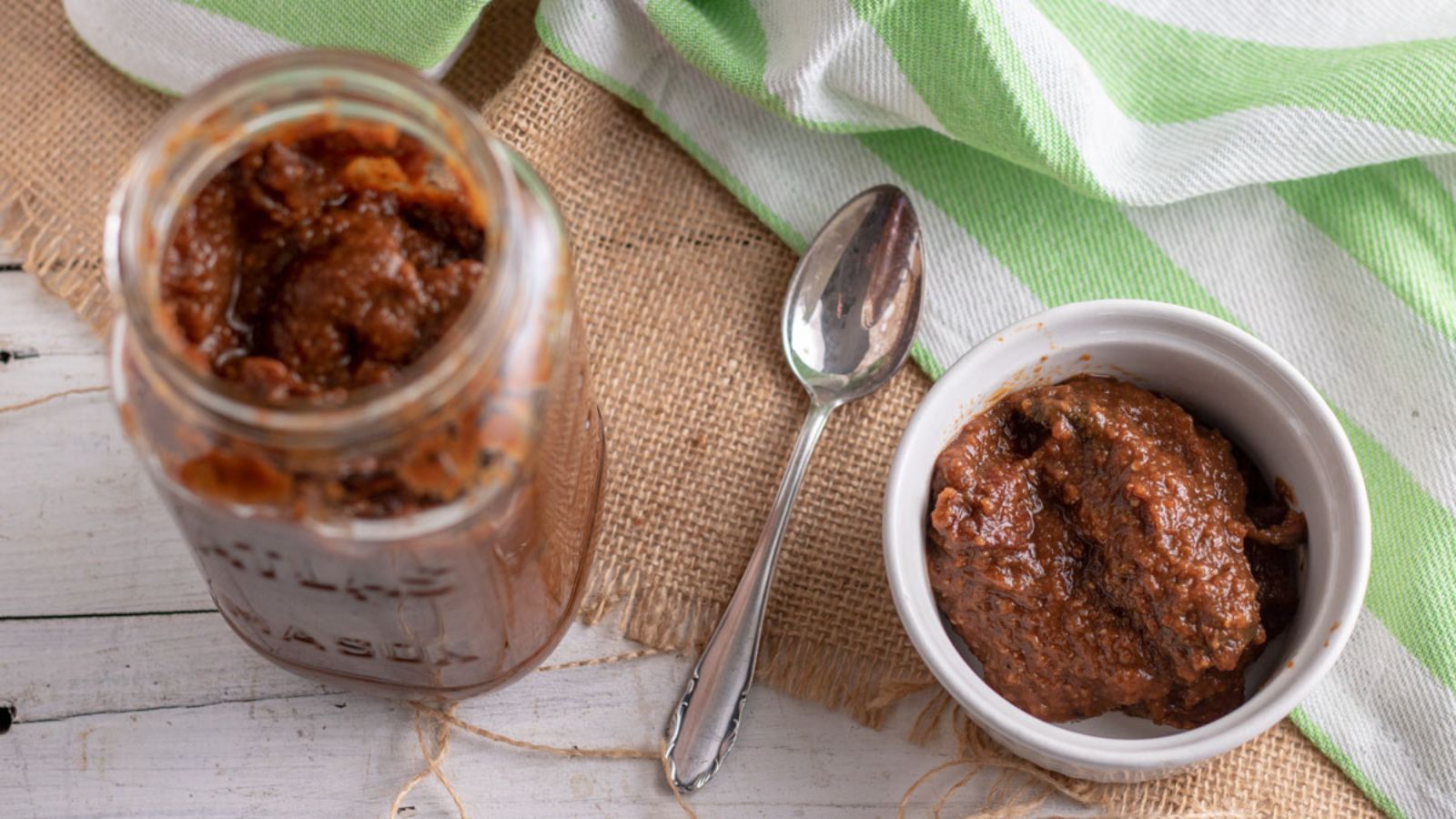 Adobo sauce in a jar and in a bowl.