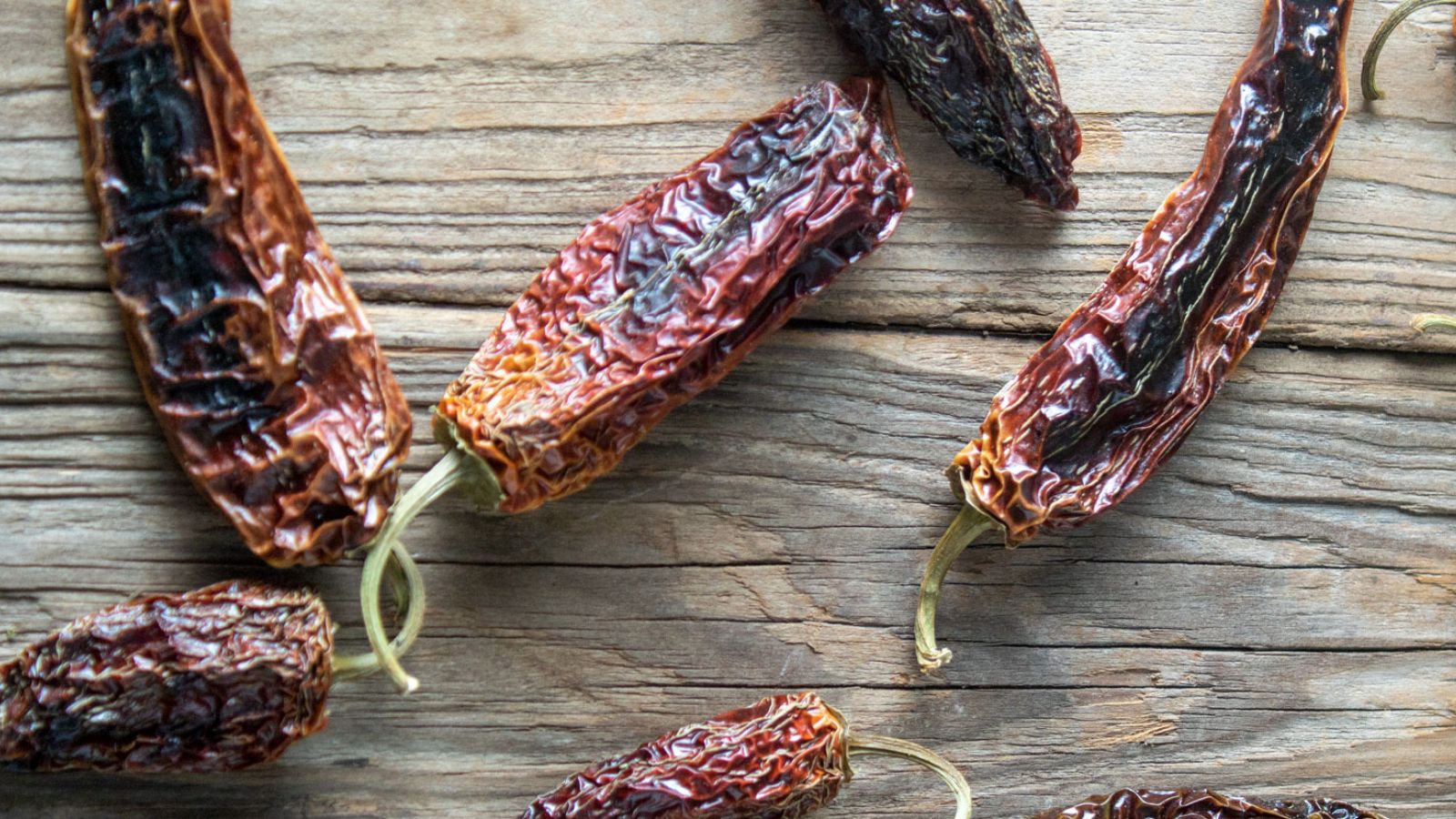 smoked chipotles on barnwood