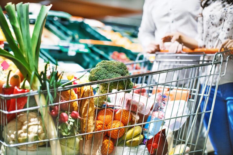 Shopping cart filled with groceries
