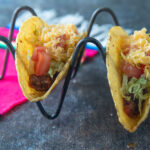 Hard shell tacos with ground beef.