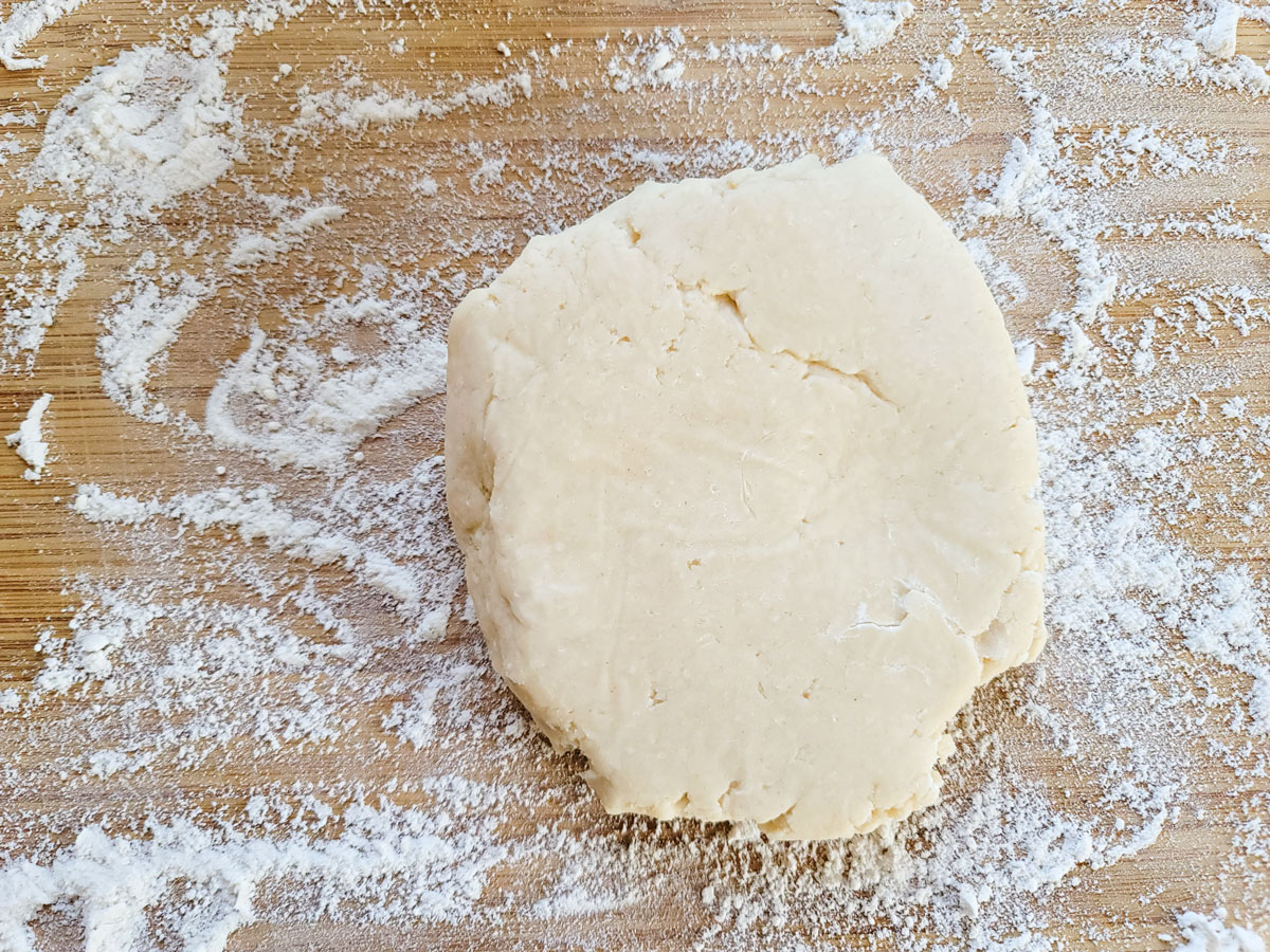 Dough ball on a floured board.