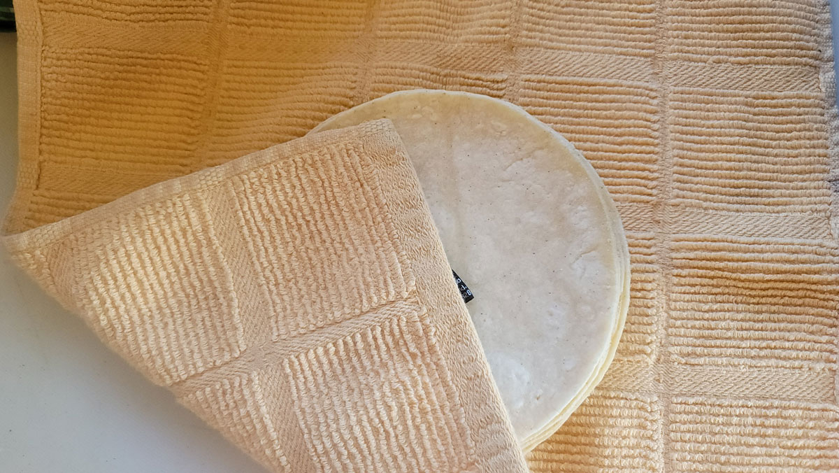 Tortillas in a damp towel.