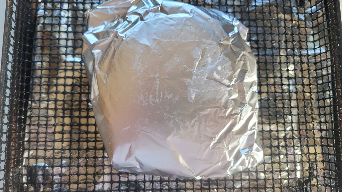 Wrapped taco shells in aluminum foil pouch.