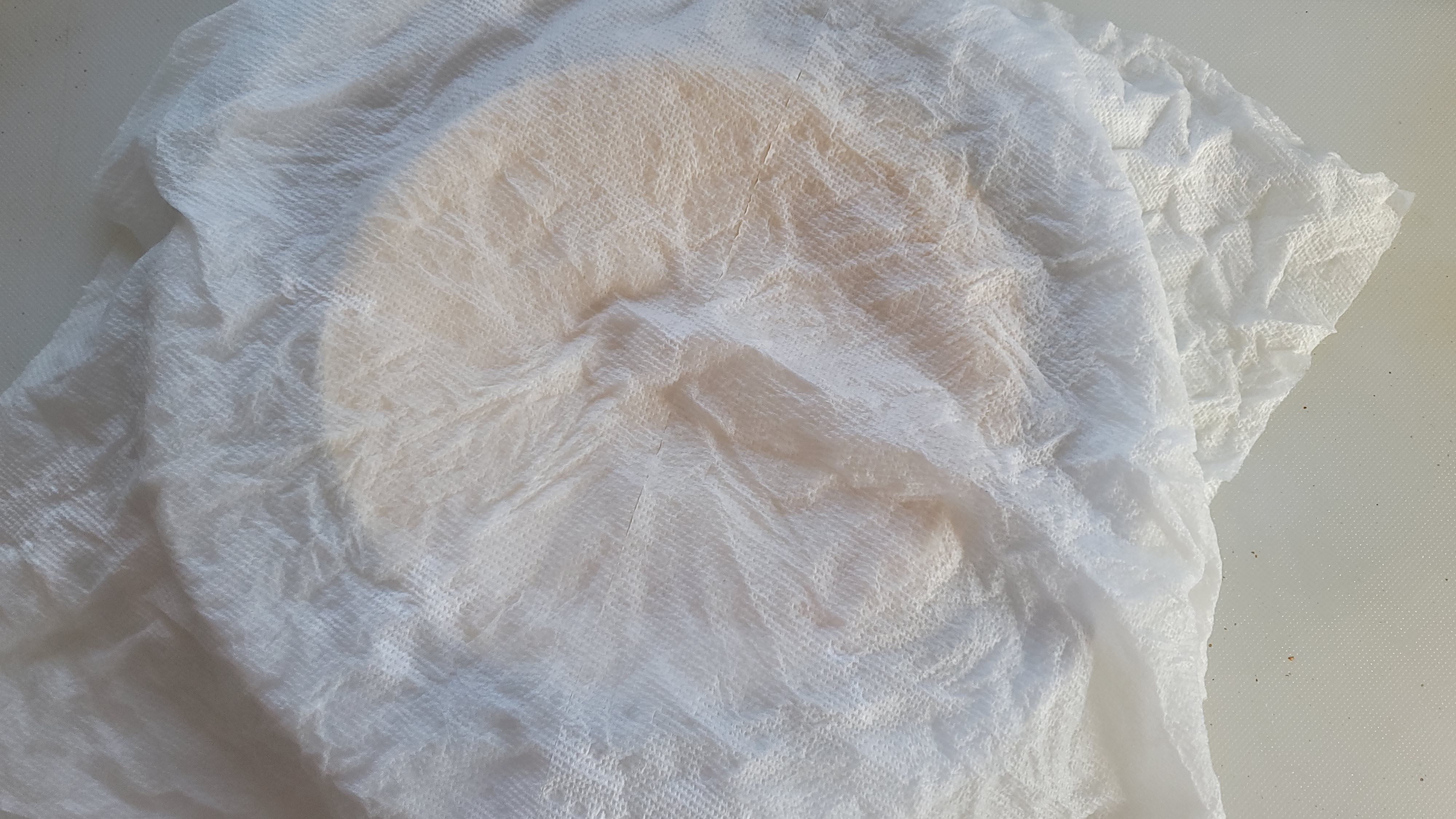 Plate covered with a paper towel.