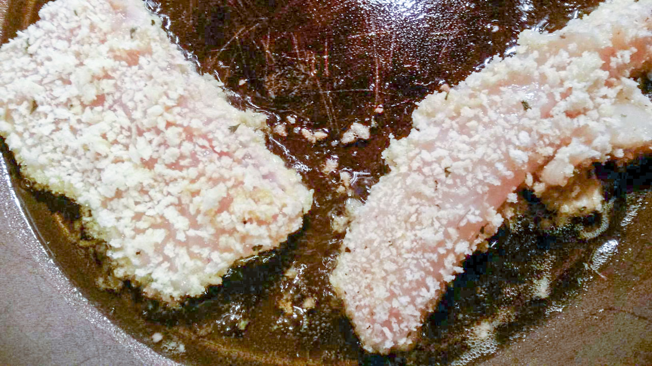 Frying filets in oil.