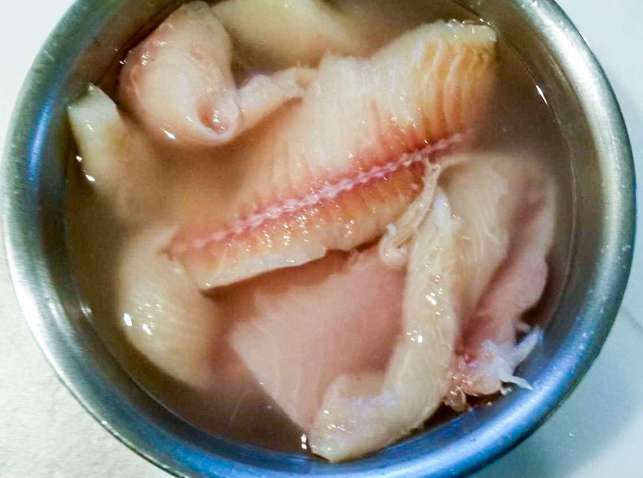 Filets added to salt water.