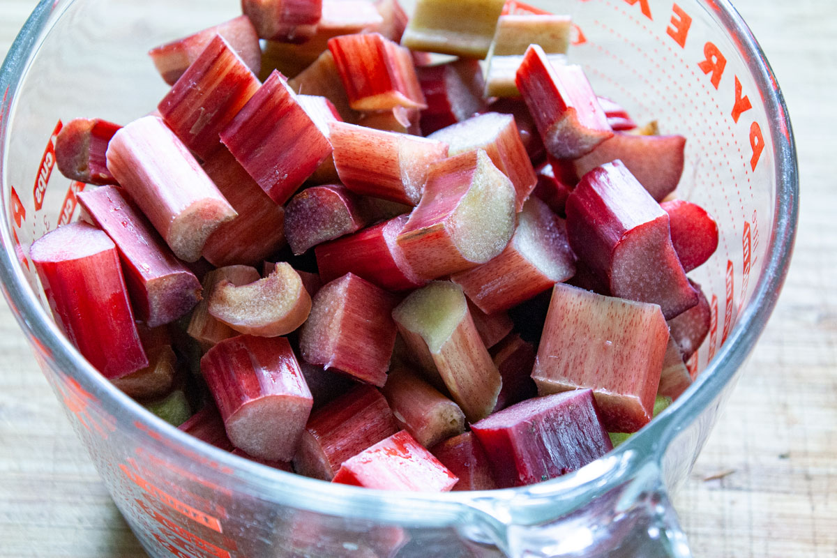 Sliced rhubarb in a large measuring cup.