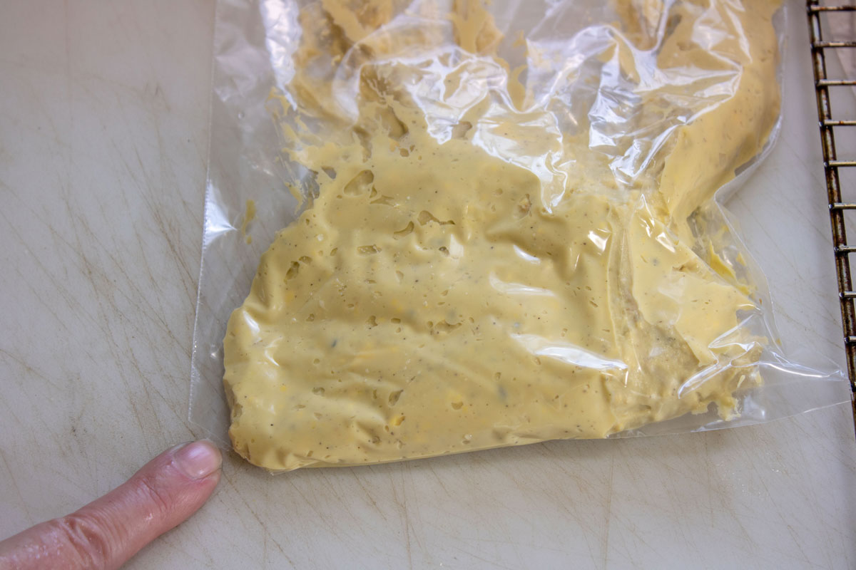 Storage bag with the corner cut out.