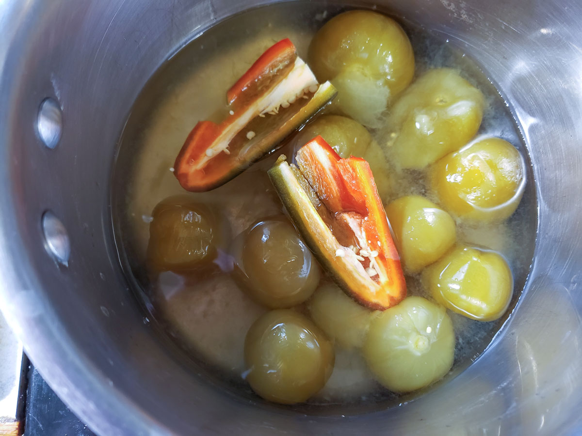 Jalapeño added to the pot.