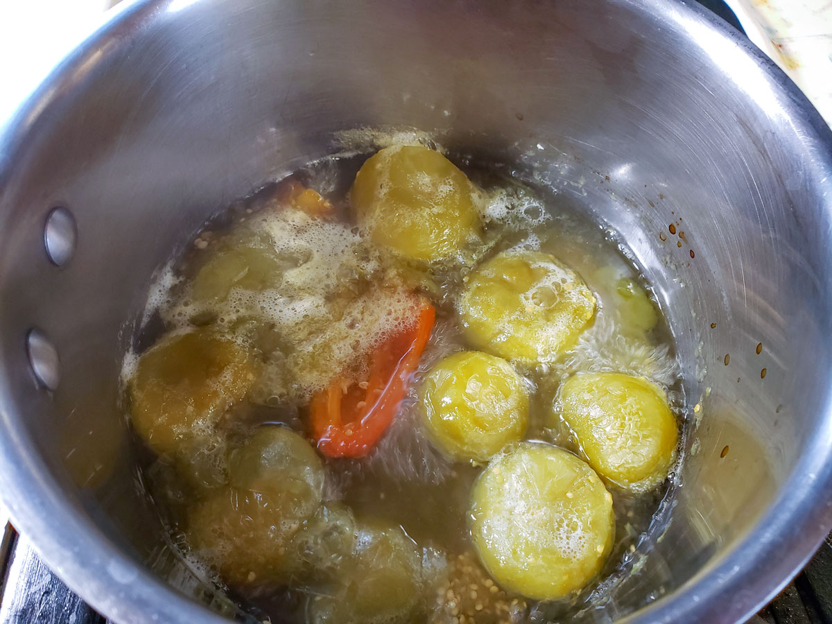 Peppers and tomatillos cooked until soft.