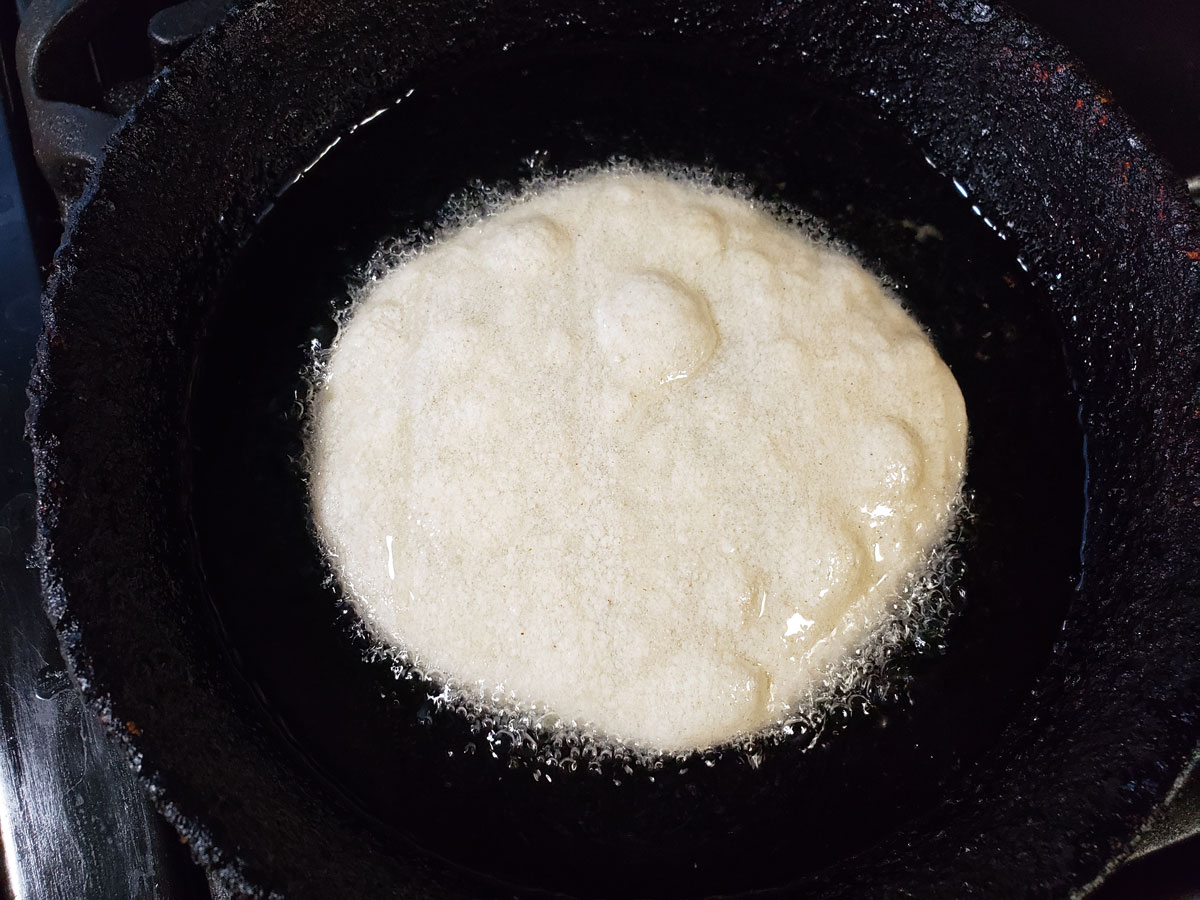 Softening tortillas in oil.