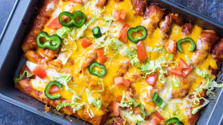 Over photo of tray filled with enchiladas.