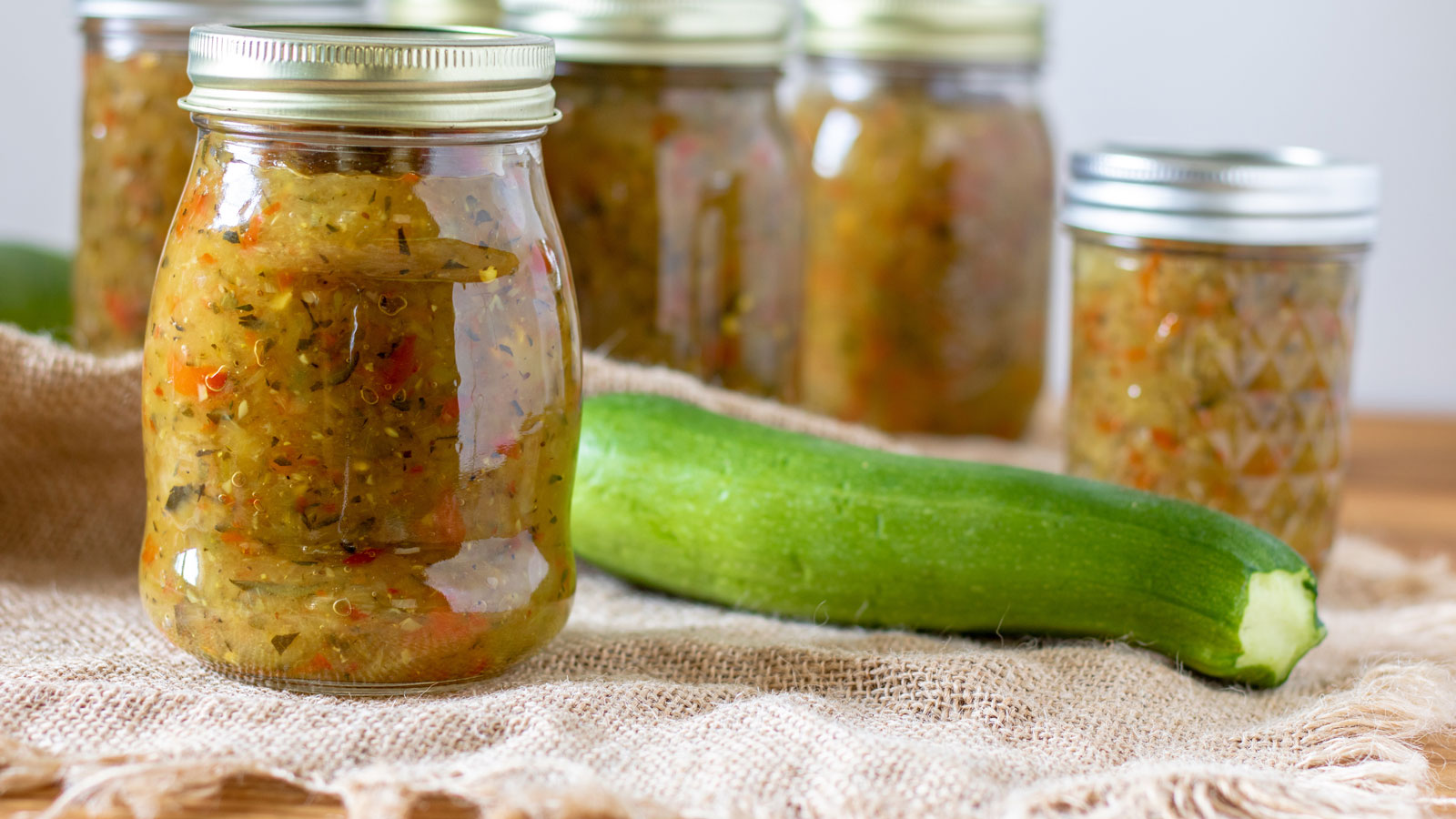 Zucchini relish in canning jars.