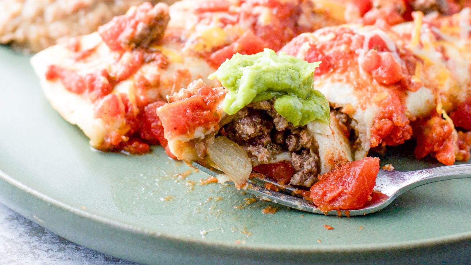 beef enchiladas on a plate