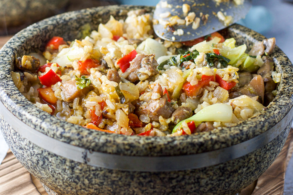 Colorful Bibimbap in a gray bowl.