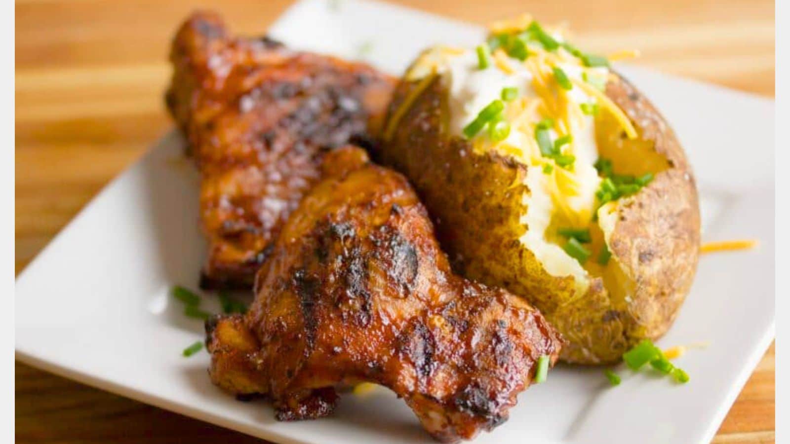 Grilled chicken with potato on the side.
